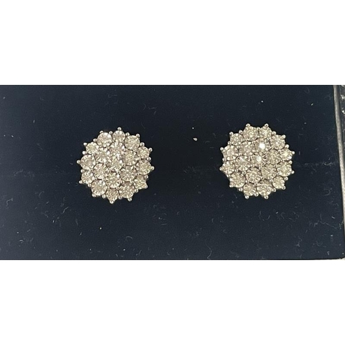 1019 - A pair of white 9ct gold fine diamond earrings, total weight 5 grams.