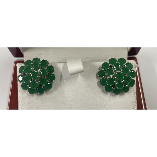 1020 - A pair of silver and emerald earrings.