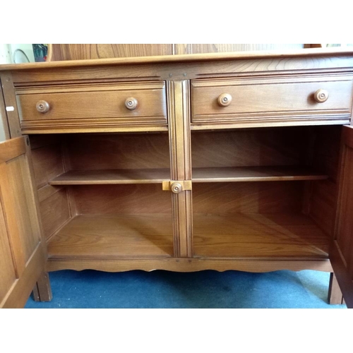 389 - An Ercol medium oak dresser