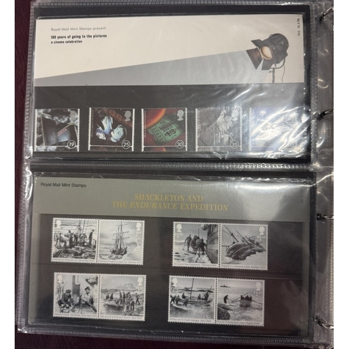 1200L - A good album of Royal Mail presentation packs, mainly 1st class stamps & an album of first day cover... 