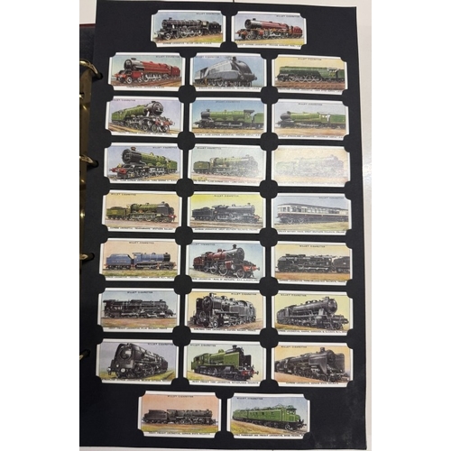 1200Q - An album of reproduction cigarette cards with many sets