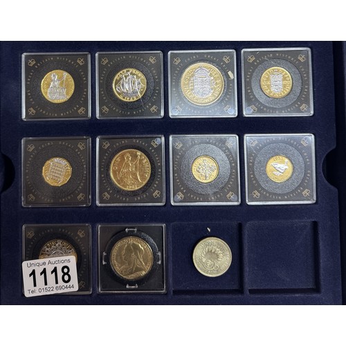 1118 - Eight cased Queen Elizabeth II gold plated coins and a Victorian coin.