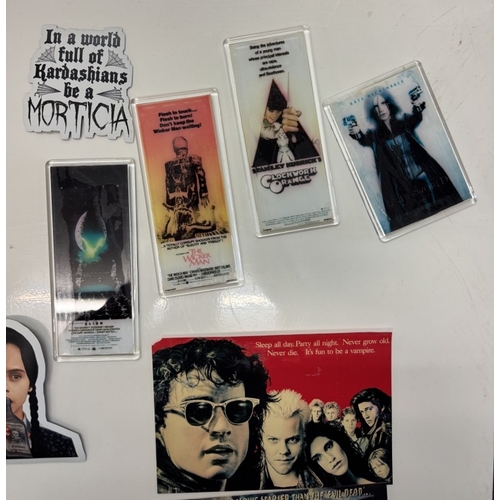 340A - A quantity of film related magnets postcards etc