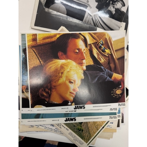 340E - A collection of film related front of house/lobby cards, stills & prints etc. including Jaws & Alien... 