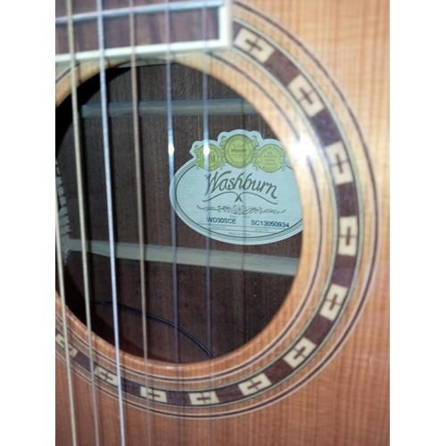 1469 - A Washburn WDSCE Dreadnaught Cutaway acoustic-electric guitar in hard case COLLECT ONLY