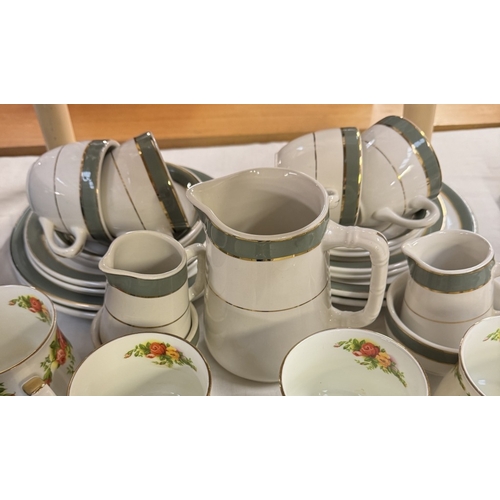 1694 - A small 12 piece tea set & a quantity of mugs including Denby