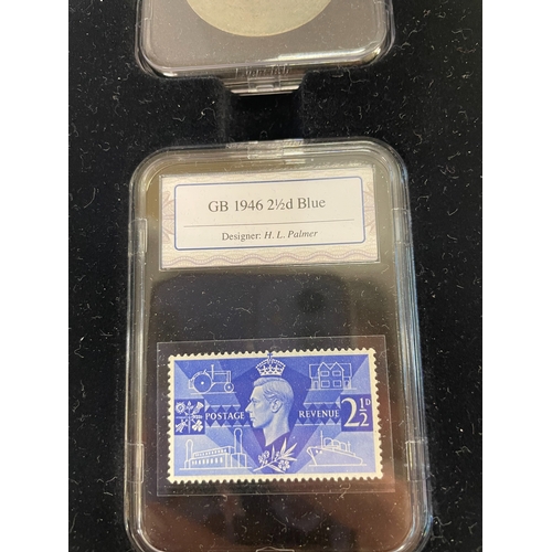 1124 - A cased 'End of WWII' coin and stamp collection.