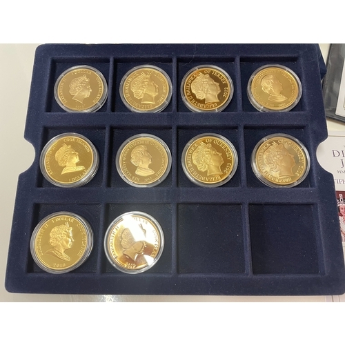 1116 - 22 cased 1952 - 2012 Diamond Jubilee gold plate coins, A Royal engagement coin and a Roman Army coin... 