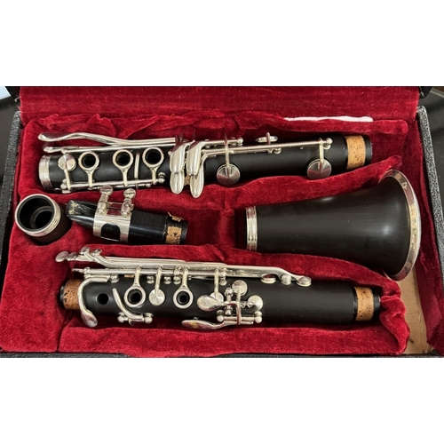 1702 - A cased clarinet