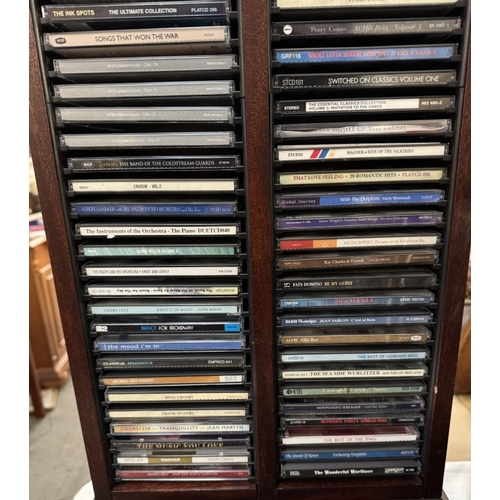 1705 - A good lot of CD's & DVD's including Christine in Blu-Ray & a CD stand COLLECT ONLY