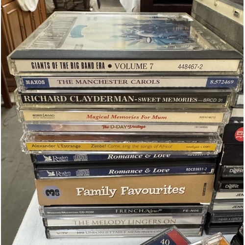 1705 - A good lot of CD's & DVD's including Christine in Blu-Ray & a CD stand COLLECT ONLY