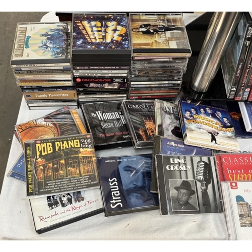 1705 - A good lot of CD's & DVD's including Christine in Blu-Ray & a CD stand COLLECT ONLY