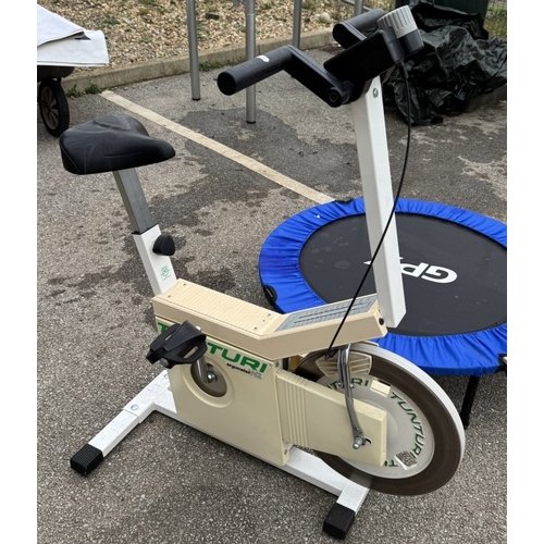 1754 - A Tunturi exercise bike & small trampoline