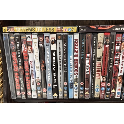 1795 - A quantity of DVDs including Laurel & Hardy & John Wayne box sets