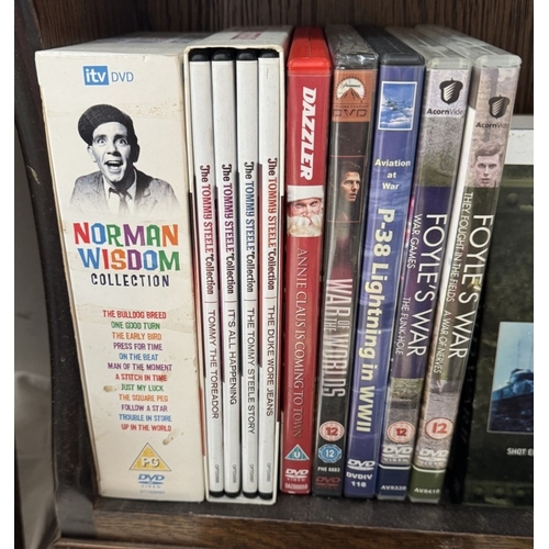 1795 - A quantity of DVDs including Laurel & Hardy & John Wayne box sets