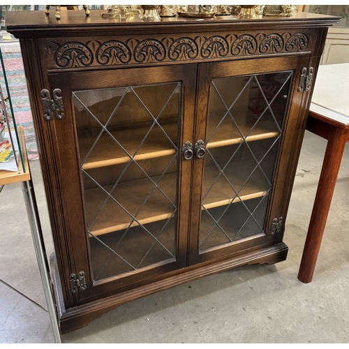 1855 - A dark oak bookcase / display cabinet with leaded glass doors COLLECT ONLY