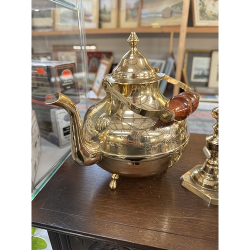 1856 - A Victorian brass trivet, 2 pairs of candlesticks & other brassware including oil lamps, kettle etc