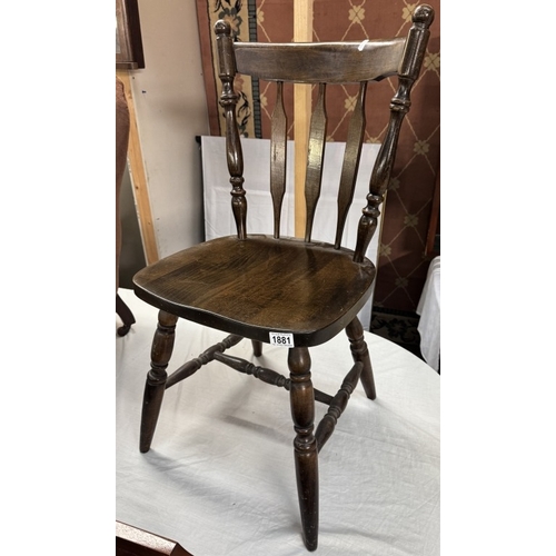 1881 - A dark wood kitchen chair COLLECT ONLY