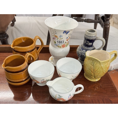 1883 - A quantity of jugs, An Aynsley vase, Wedgwood sugar bowls, Milk jug etc