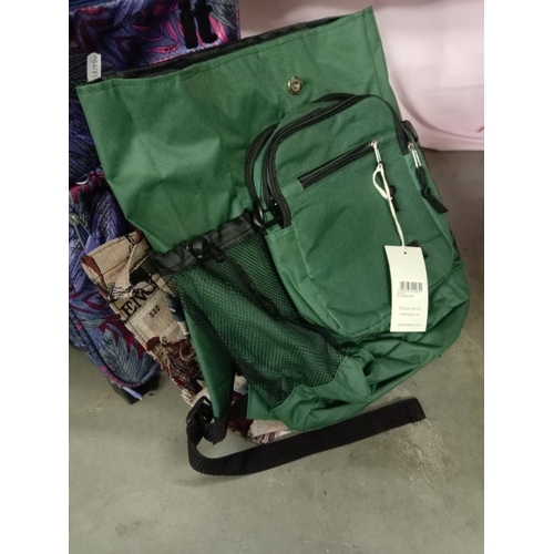 1664 - A new back pack with labels, 2 suitcases & a ladies bag COLLECT ONLY