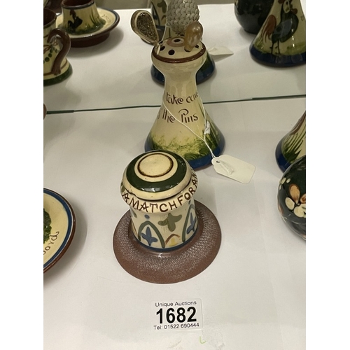 1682 - Six items of Torquay Motto ware including hat pin stands.