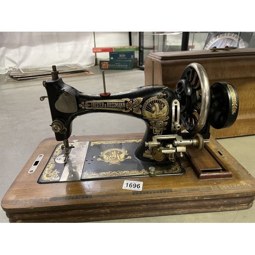 1696 - A vintage cased Frister and Rossman sewing machine, COLLECT ONLY.