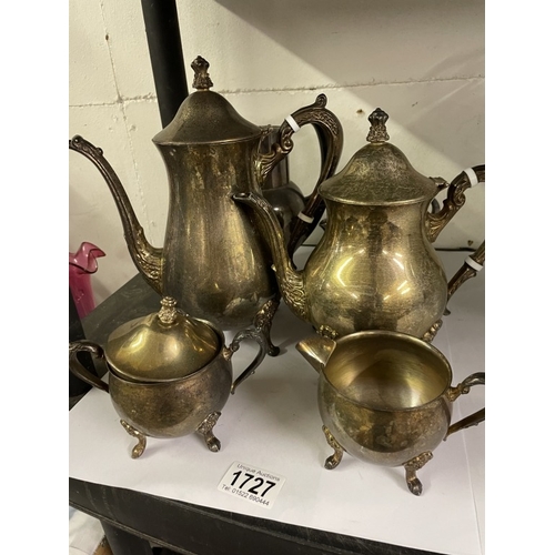 1727 - A quantity of silver plate including coffee pots, jugs etc.,