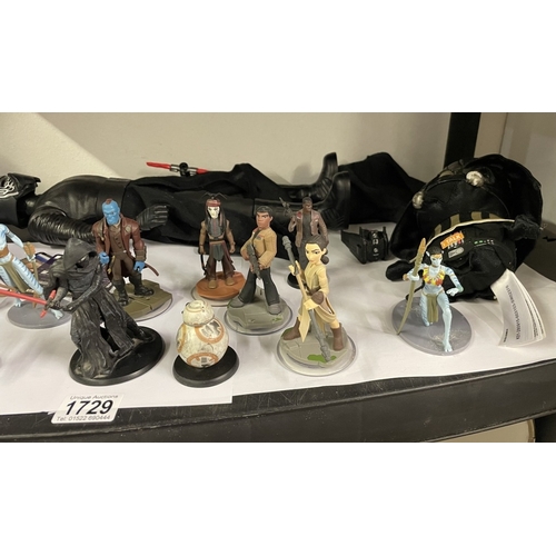 1729 - A collection of Star Wars figures including Disney & Infinity etc.