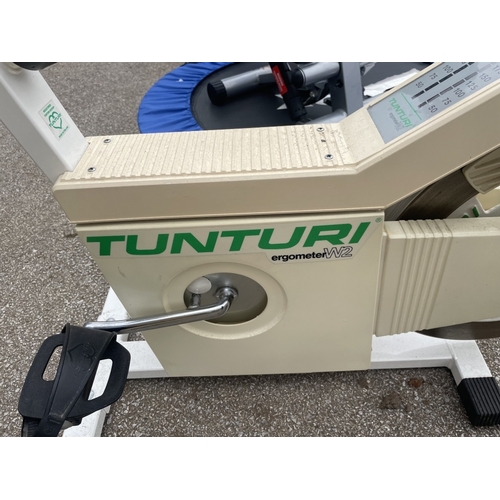 1817 - A Tunturi exercise bike, trampoline & foot exerciser COLLECT ONLY