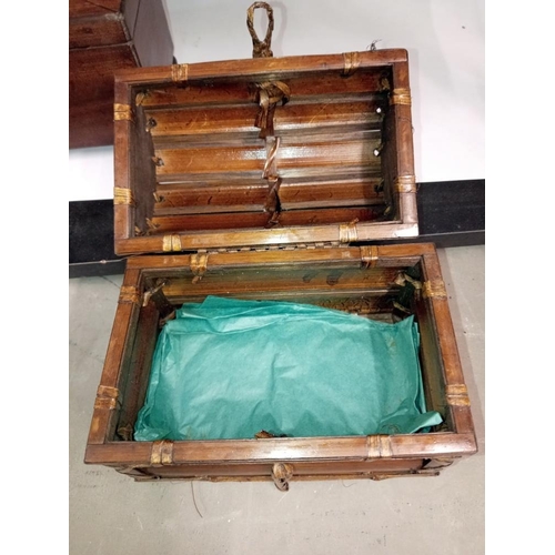 1742 - A 19th century mahogany sarcophagus tea caddy & a bamboo dome top box with strung joints