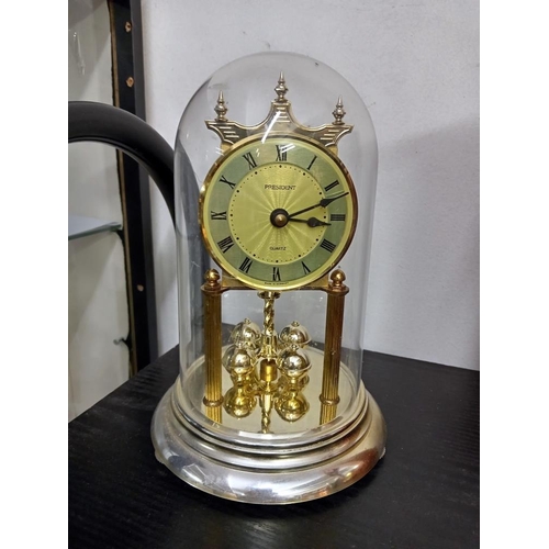 1743 - A President Quartz anniversary clock under plastic dome & 1 other