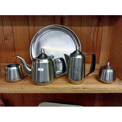 1764 - An Ofida Continental silver plate 5 piece tea set including tray & A copper finish 4 piece tea set i... 