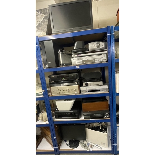 1889 - A large selection of electrical goods. TV's, DVD & VHS players, HiFi & computer parts etc. (5 shelve... 