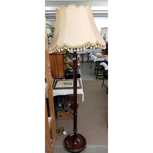 1960 - A mahogany barley twist standard lamp. COLLECT ONLY.