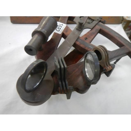 1682 - A late 20th century oak and brass sextant.