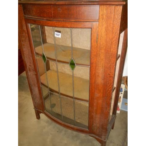 1687 - An Edwardian bow front leaded glazed display cabinet. COLLECT ONLY.