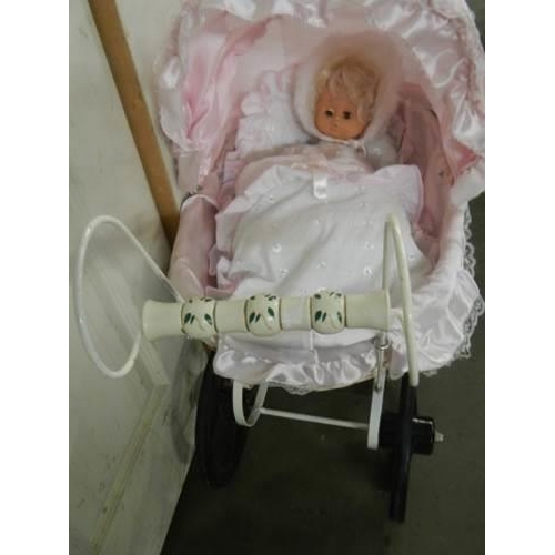 1604 - A late 20th century replica dolls pram with doll. COLLECT ONLY.