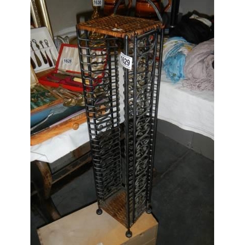 1629 - A wrought metal CD stand, COLLECT ONLY.