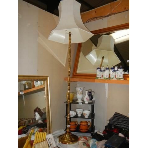 1630 - A brass standard lamp in good condition. COLLECT ONLY.