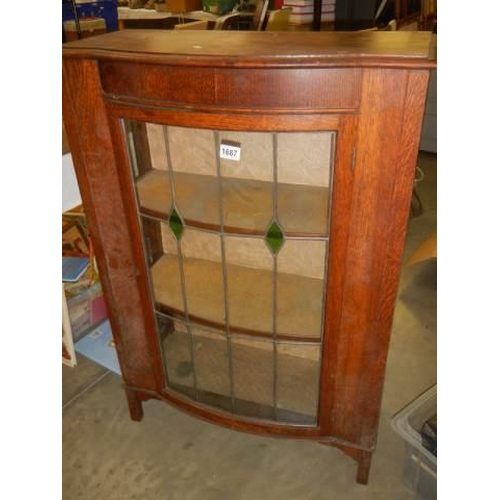 1687 - An Edwardian bow front leaded glazed display cabinet. COLLECT ONLY.