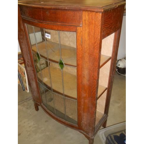 1687 - An Edwardian bow front leaded glazed display cabinet. COLLECT ONLY.