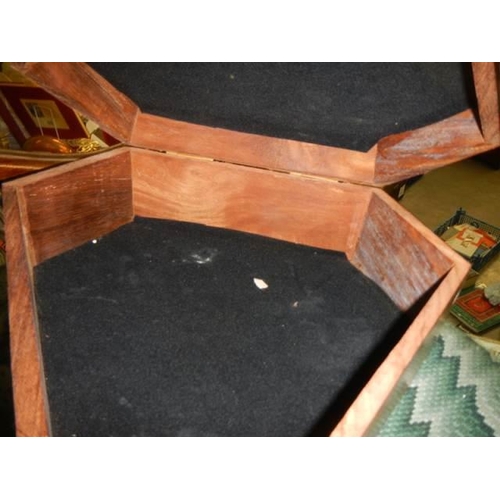 1690 - A teak box with brass inlay.