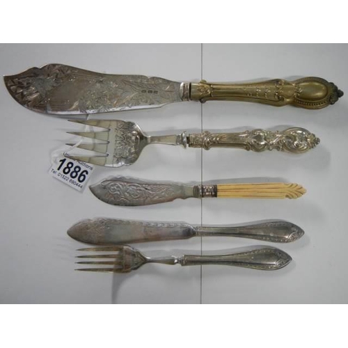 1886 - A pair of silver plate fish servers and three other items.