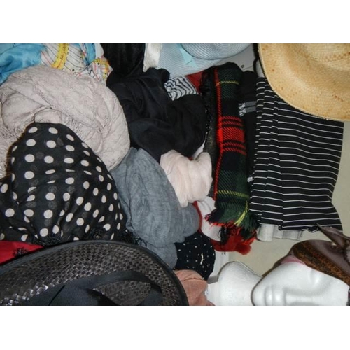 1645 - A good lot of hats and scarves.