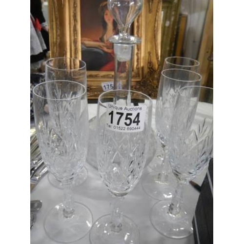 1754 - A mid 20th century glass decanter and six glasses, in good condition.