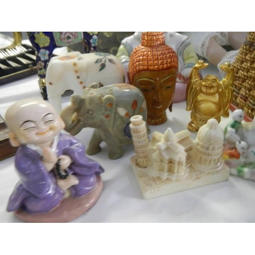 1758 - A mixed lot of Asian related ceramic figures etc.,