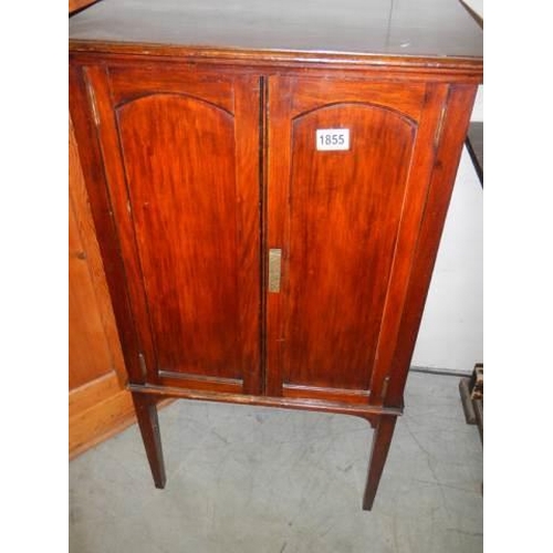 1855 - An oak two door music cabinet, COLLECT ONLY.