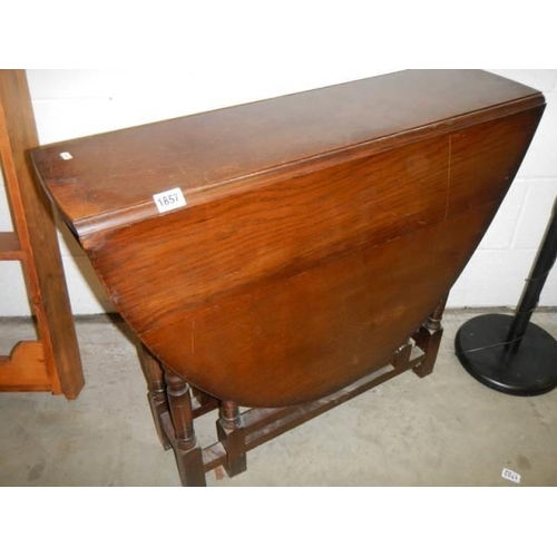 1857 - An oak gate leg table, COLLECT ONLY.