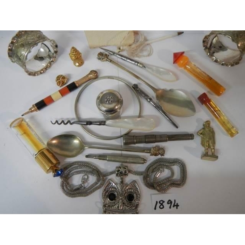 1894 - A mixed lot including perfume bottles, pencils, napkin rings etc.,