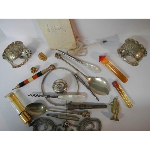 1894 - A mixed lot including perfume bottles, pencils, napkin rings etc.,